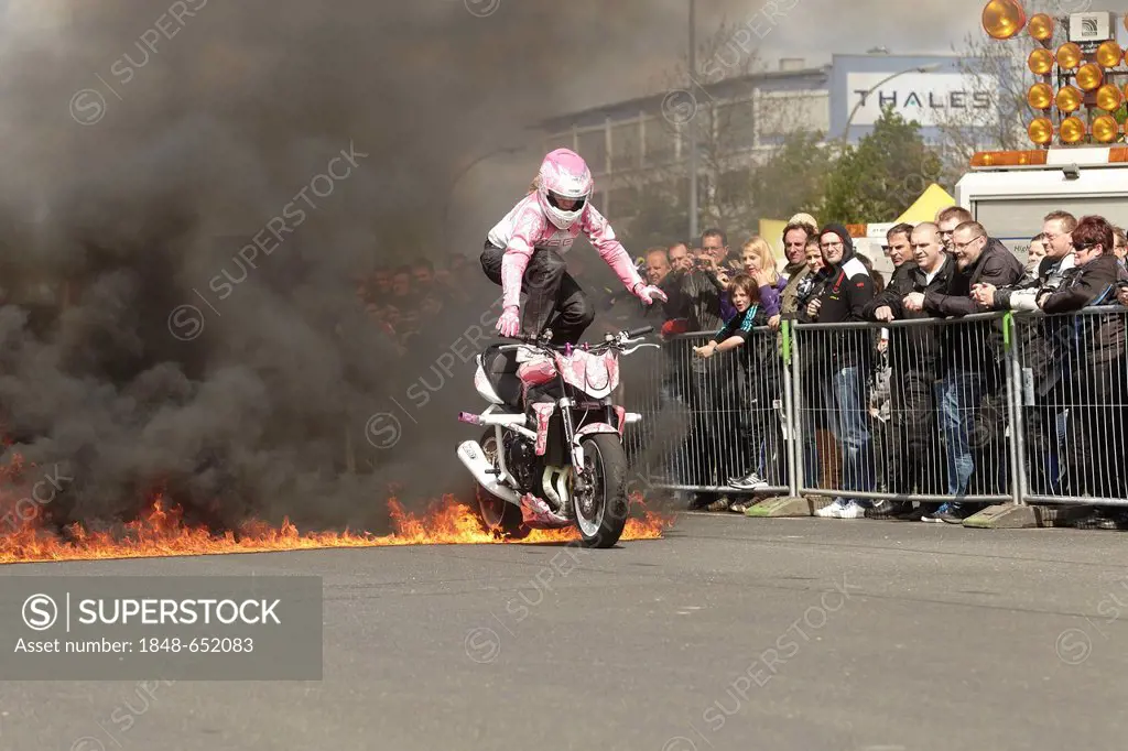 Motorcycle stunt show with stunt woman Mai-Lin Senf at the motorcycle Start-up Day of the ADAC, German automobile club, Koblenz, Rhineland-Palatinate,...