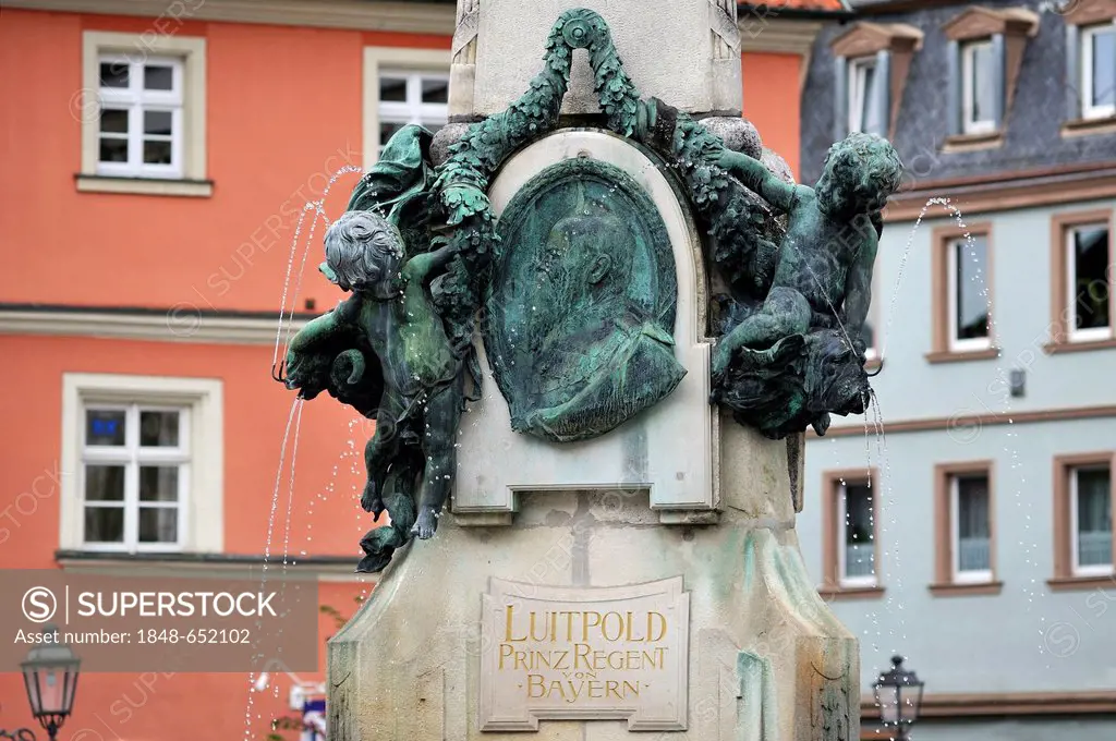 Two angels framing the portrait of Prince Regent Luitpold of Bavaria, detail view of the Luitpoldbrunnen fountain, built in 1898, market square, Kulmb...