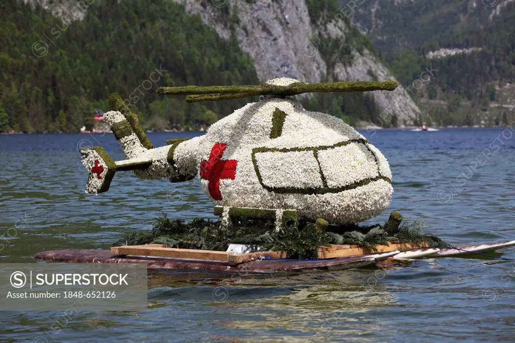 Helicopter made of daffodils by the Red Cross youth club, boat parade on lake Altausseer See, Daffodil Festival, Altaussee near Bad Aussee, Ausseerlan...