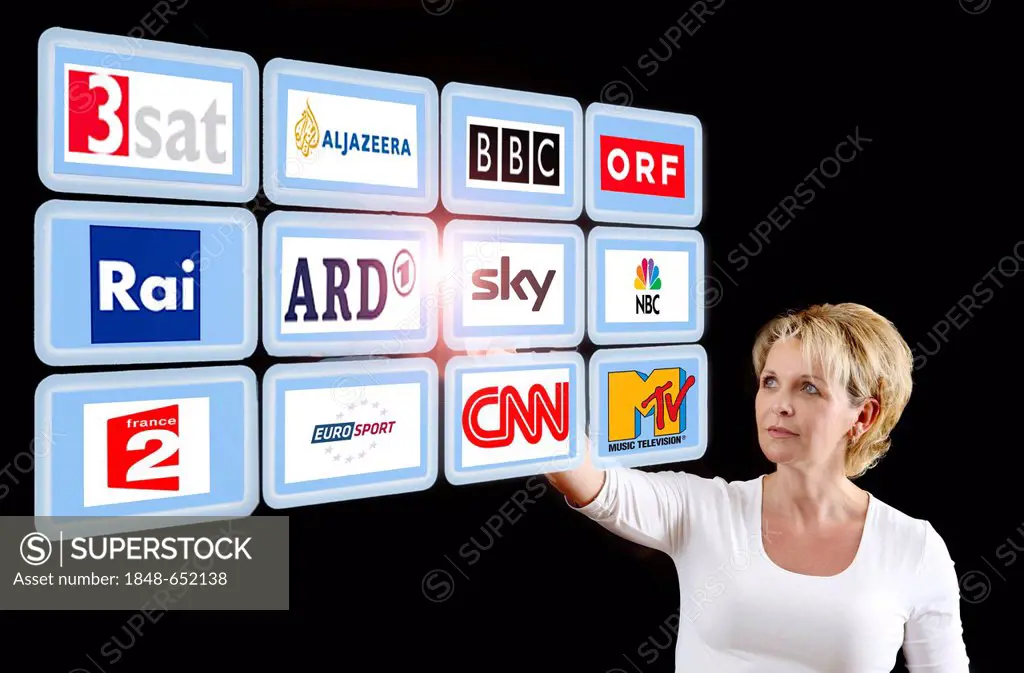 Woman working with a virtual screen, touch screens, European television stations