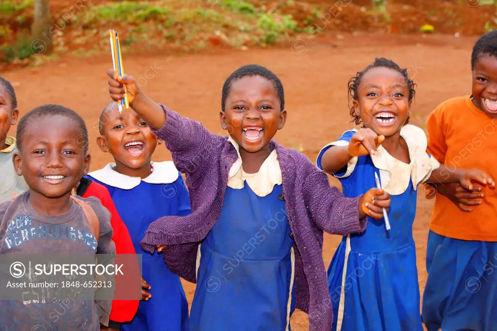 School children, 7, wearing school uniforms and looking forward to attending primary school, Bamenda, Cameroon, Africa