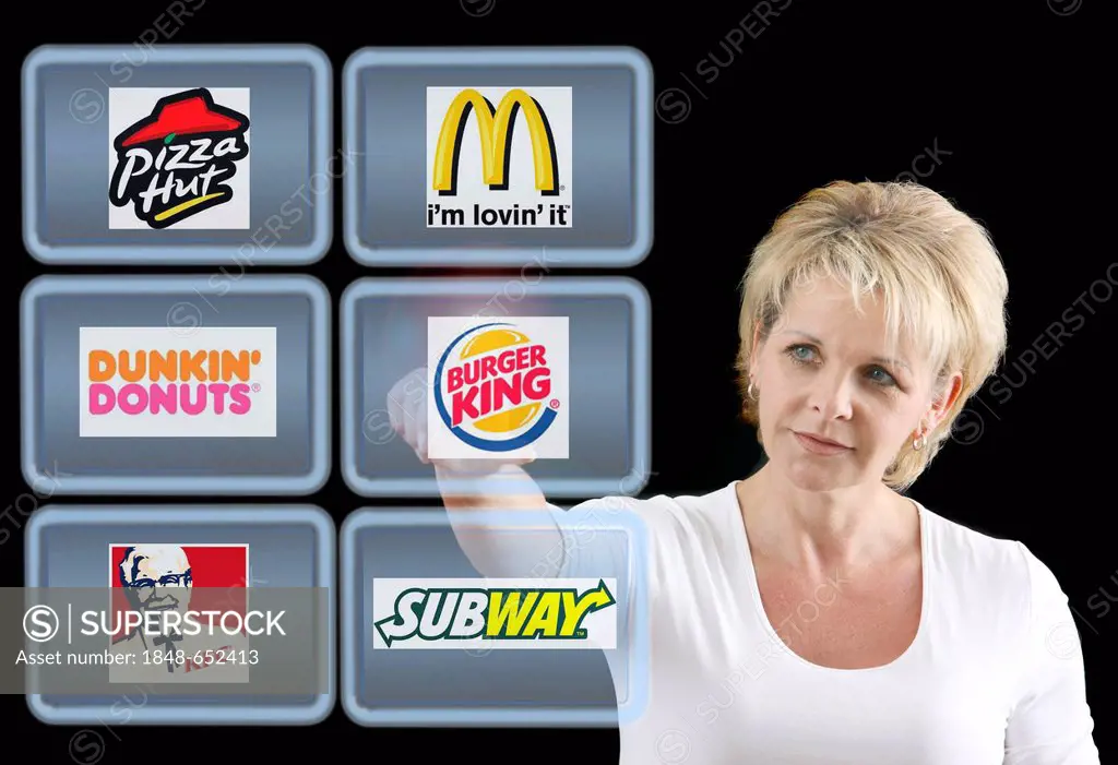 Woman working with a virtual screen, touch screens, fast food chains