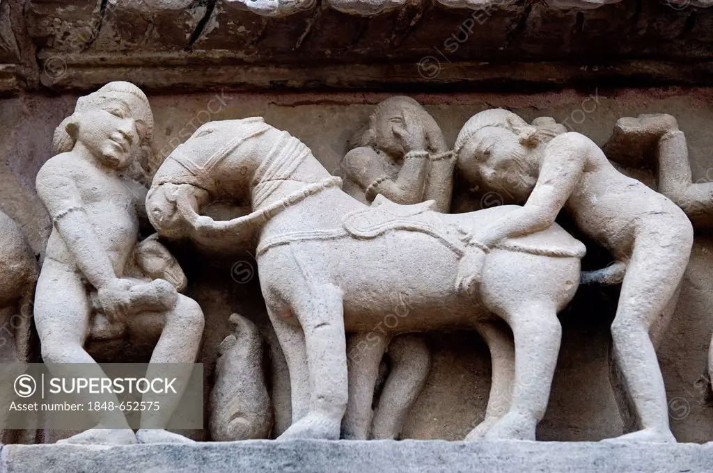 Erotic relief, Khajuraho Group of Monuments, UNESCO World Heritage Site, Madhya Pradesh, India, Asia