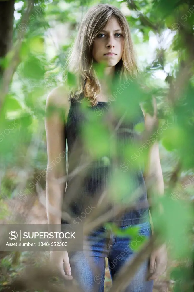 Young woman, in natural surroundings