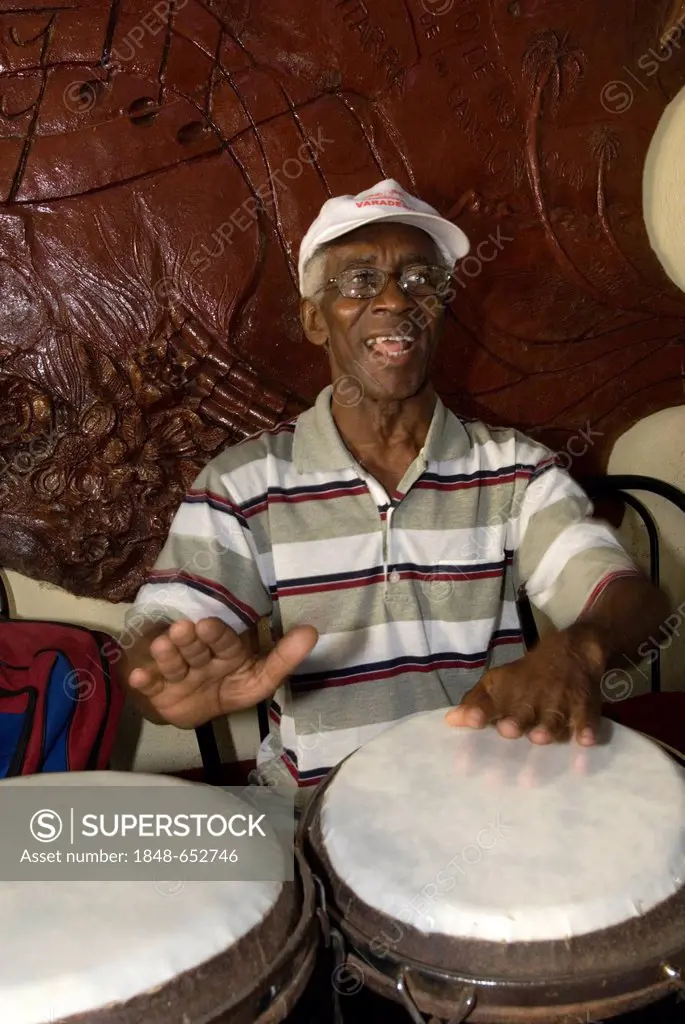 Musician playing drums in the Casa de la Trova, Trinidad, Sancti Spiritus Province, Cuba, Caribbean