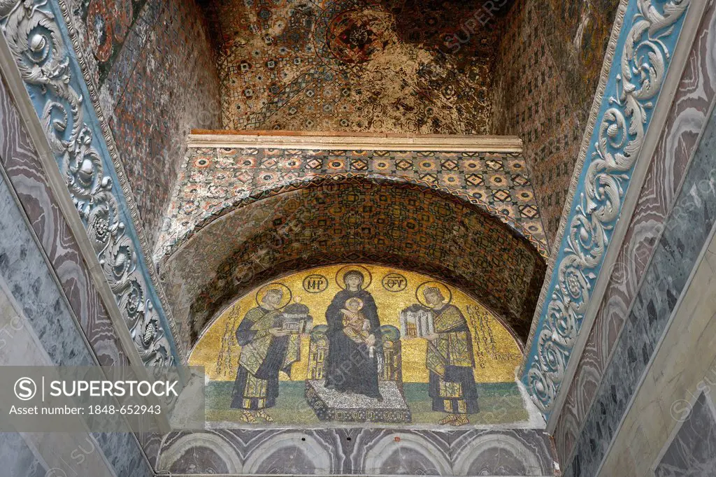 Emperor of Constantinople, Justinian, Virgin Mary with Jesus, Byzantine Deësis mosaic from the 10th Century, above the main gate, interior view, Hagia...