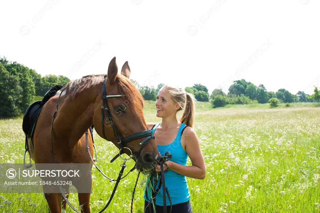 Girl with her horse