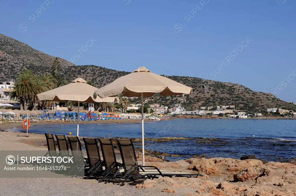 Deck chairs, parasols, beach, Malia, Crete, Greece, Europe
