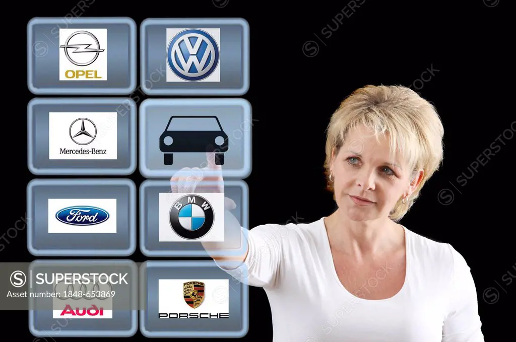 Woman working with a virtual screen, touch screen, German car brands