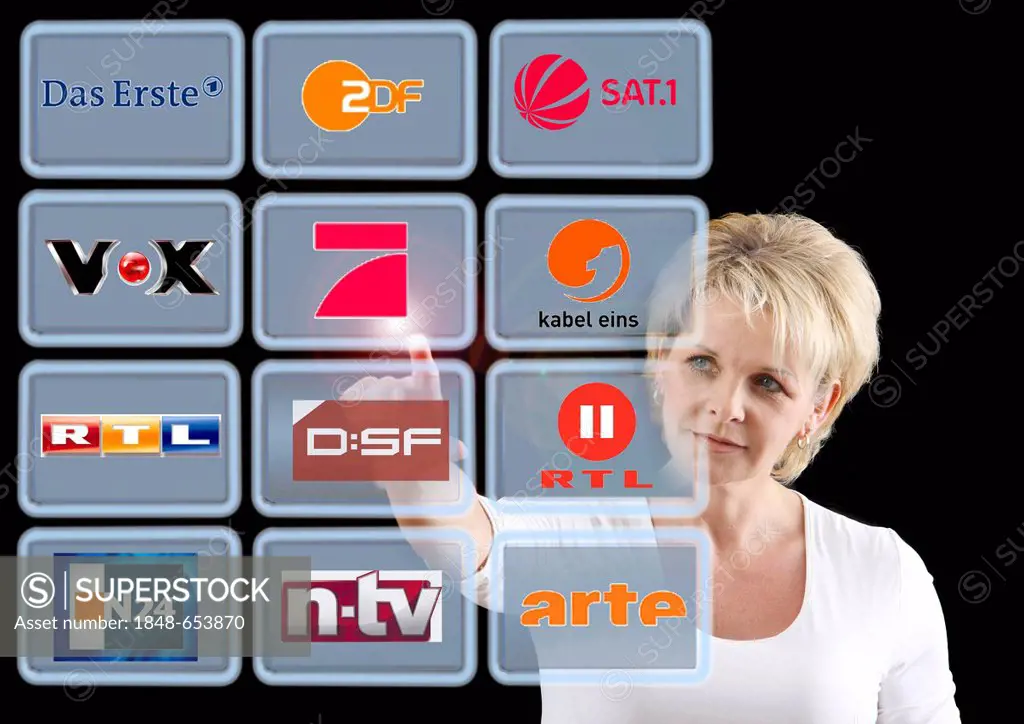 Woman working with a virtual screen, touch screens, German television stations
