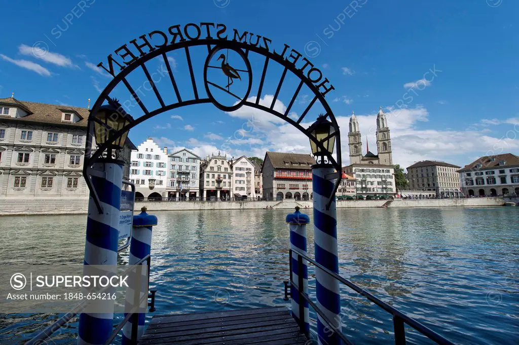 Jetty of the Storchen Hotel, Limmat river, Limmatquai with Town Hall, left, guild house Zum Rueden, twin towers of Grossmuenster church, old town of Z...