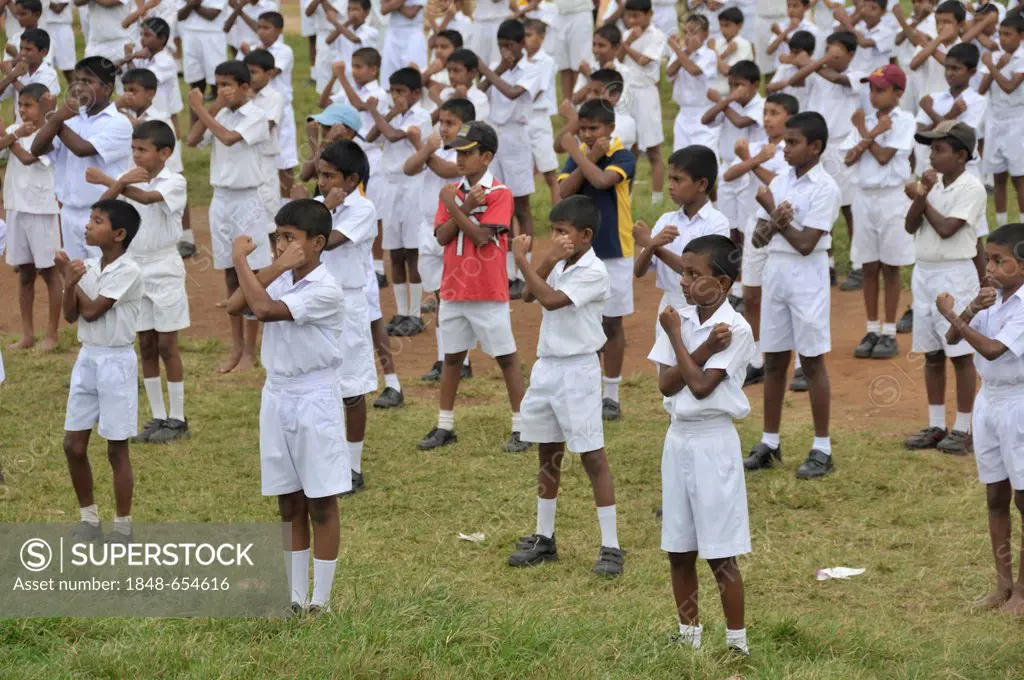 Karate classes, boys in white school uniforms, Galle, Sri Lanka, Ceylon, Asia