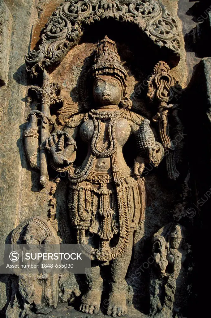 Statue of a deity, relief on the outer wall, Chennakesava Temple, Hoysala style, Belur, Karnataka, South India, India, South Asia, Asia