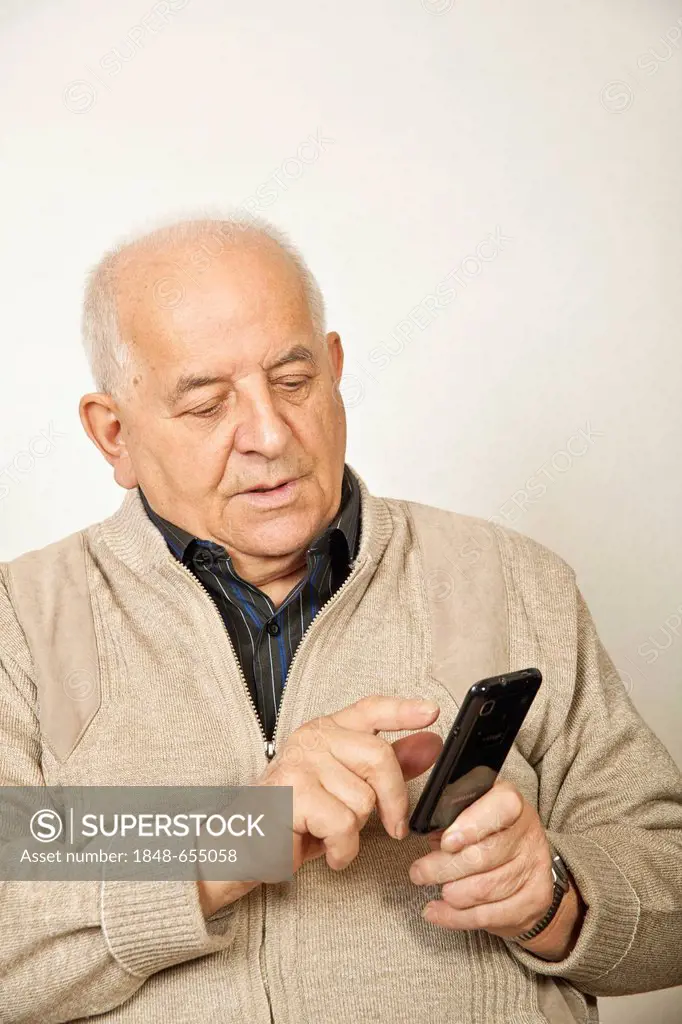 Old man with a smartphone