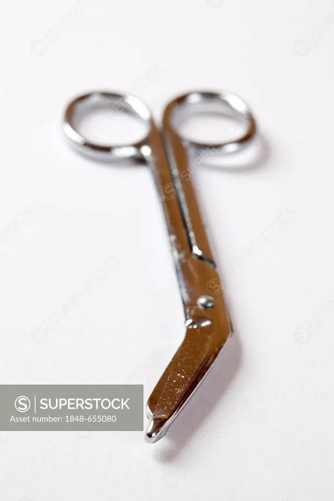 Closed bandage scissors, partly out of focus