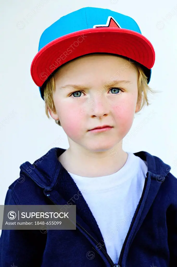 5-year-old boy wearing a baseball cap, portrait