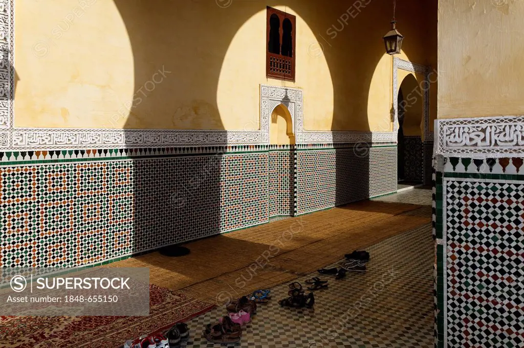 Sunlight passing through arcades, courtyart to the Mausoleum of Moulay Ismail, Meknès-Tafilalet, Morocco, North Africa, Maghreb, Africa