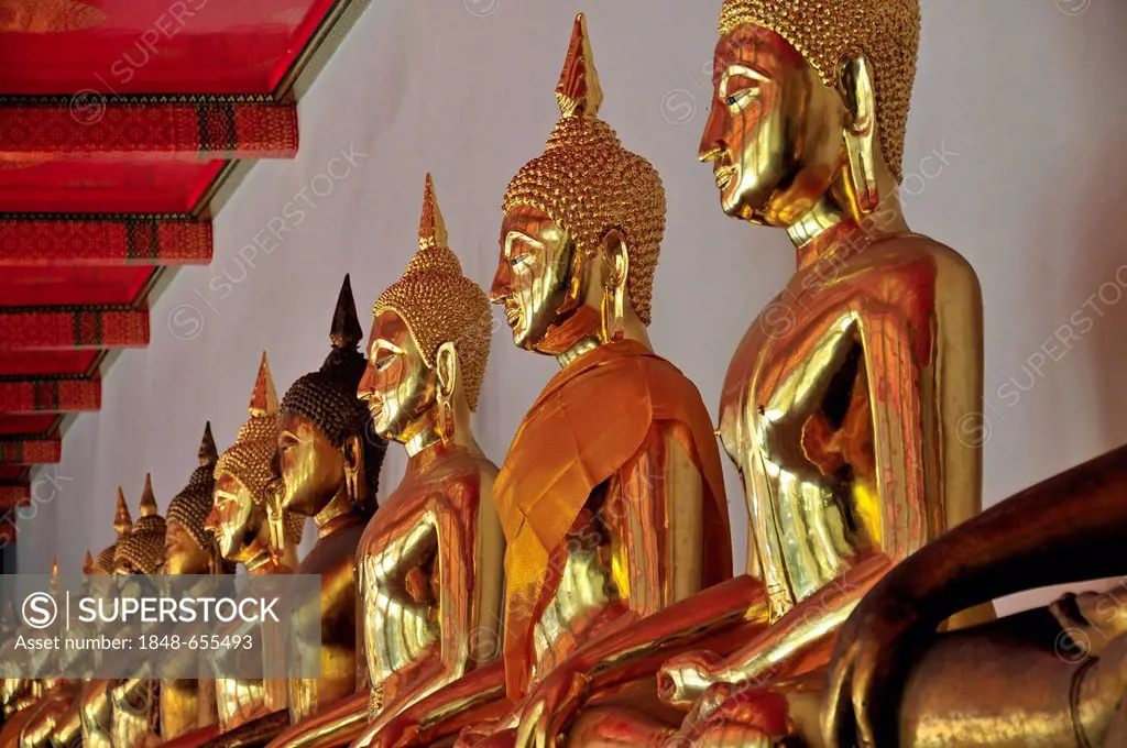 Gold-plated Buddha statues, Bhumispara-mudra, Buddha Gautama at the moment of enlightenment, Wat Pho, Bangkok, Thailand, Asia