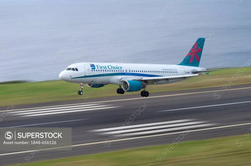 Landing approach of a passenger plane of First Choice Airways at the airport of Madeira, LPMA, Funchal Airport or Airport Santa Catarina, Madeira, Por...