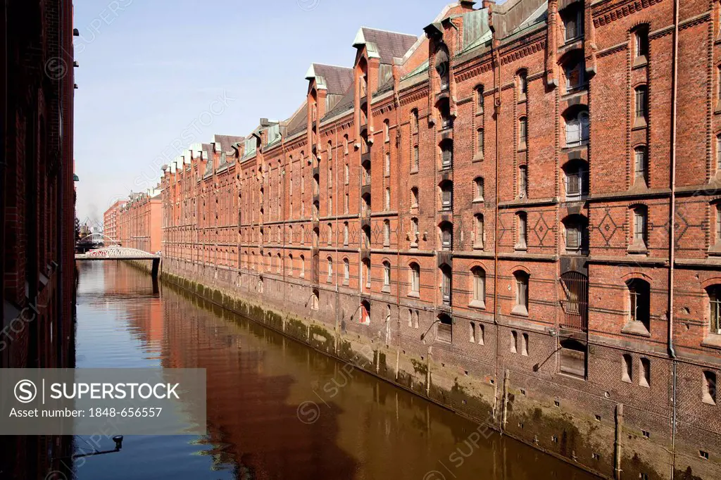 Warehouses and a channel in the Speicherstadt district, Free and Hanseatic City of Hamburg, Germany, Europe
