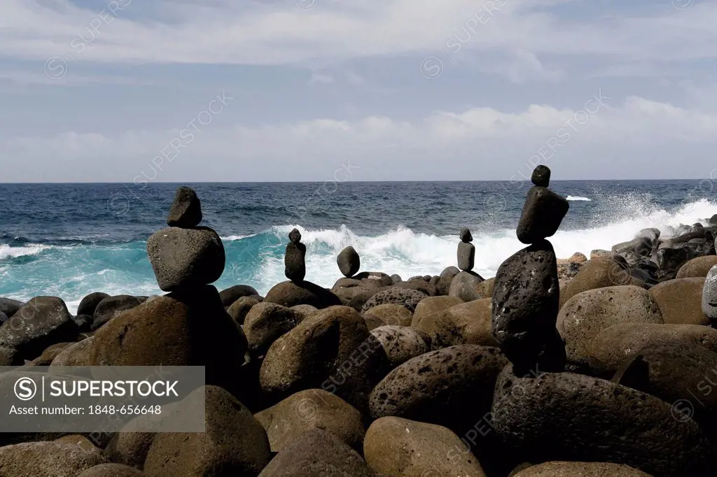 Cairns piled up at Government Beach, Pahoa Coast, Big Island, Hawaii, USA