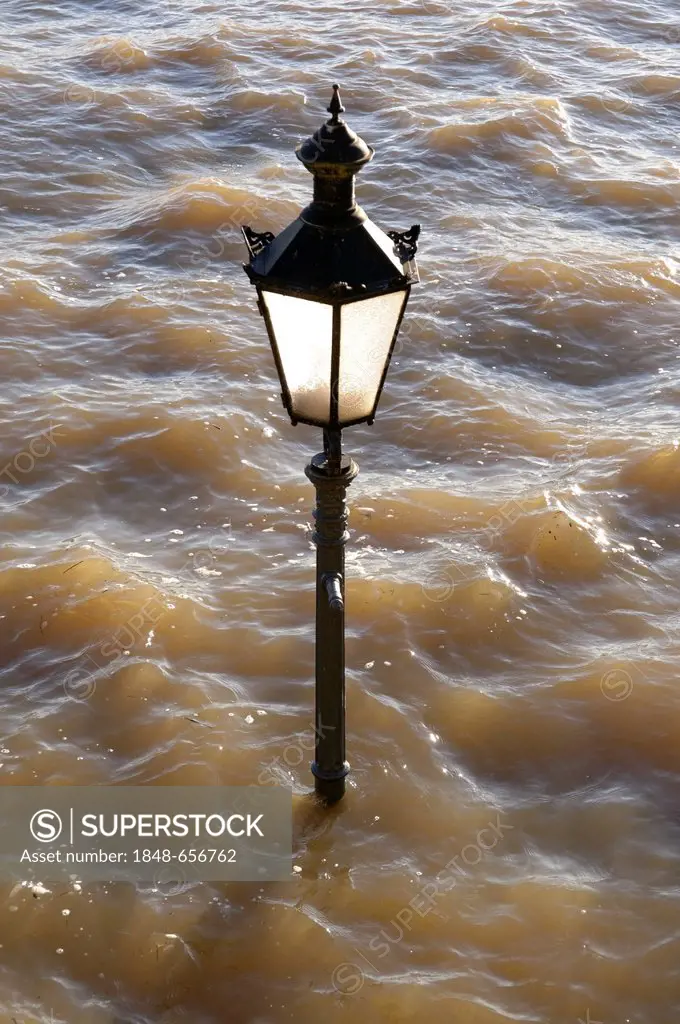 Street-lamp in high water on the Rheinpromenade at Rees, Lower Rhine, North Rhine-Westphalia, Germany, Europe