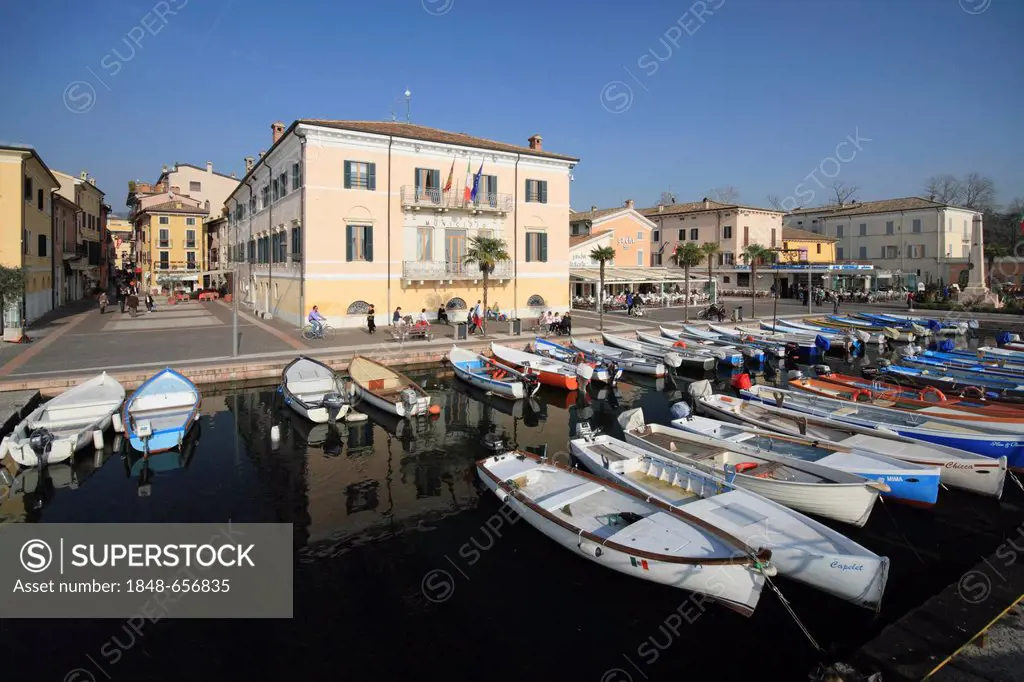 Fishing boats in the harbour and the lakeside promenade, Bardolino on Lake Garda, province of Verona, Veneto region, Italy, Europe