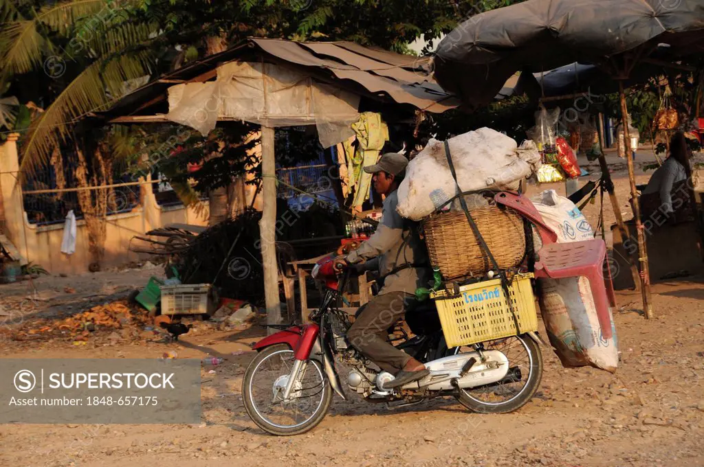Transportation on motor scooters, Sisophon, Cambodia, Asia