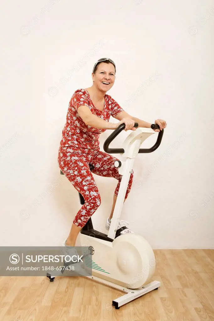 Woman working out on an exercise bike