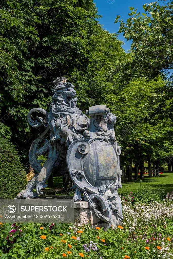 Lion sculpture, heraldic animal of Bavaria, in the park in Starnberg on Lake Starnberg, Upper Bavaria, Bavaria, Germany, Europe