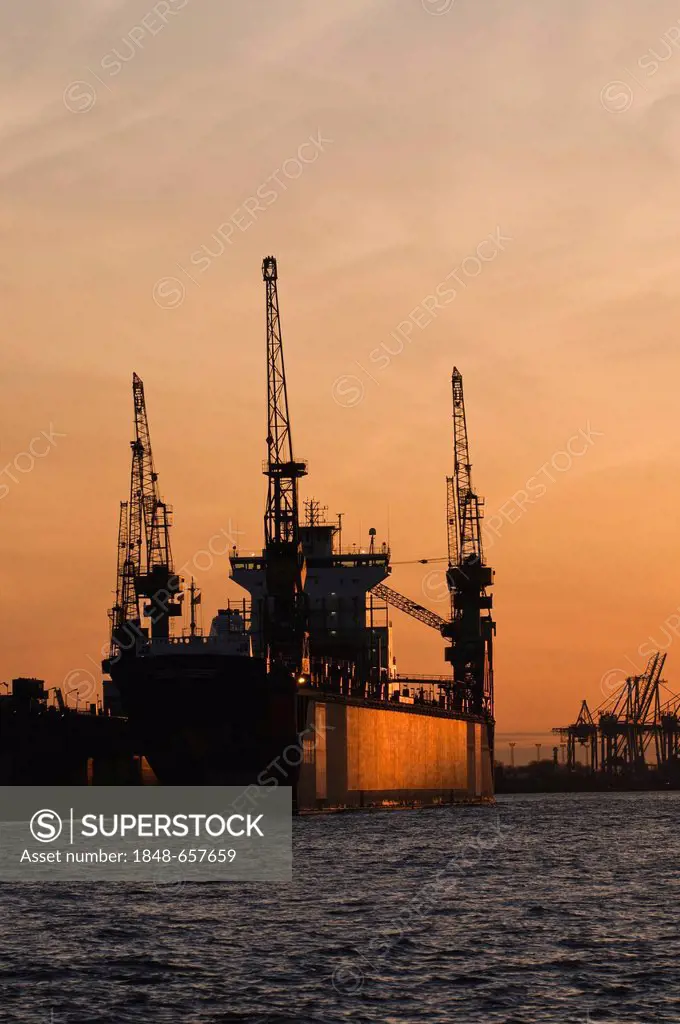 Ship in a dock, evening mood, port of Hamburg, Elbe river, Hamburg, Germany, Europe
