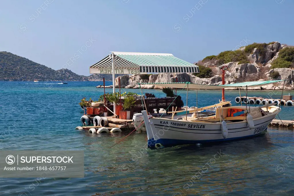 Restaurant with a boat, Kalekoey, Lycian coast, Lycia, Mediterranean Sea, Turkey, Asia Minor