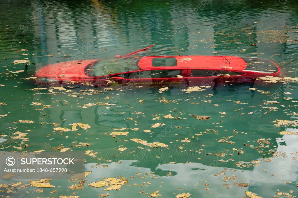 Car submerged in water, fire drill at the Teichmuehle pond, Soest, Sauerland, North Rhine-Westphalia, Germany, Europe, PublicGround