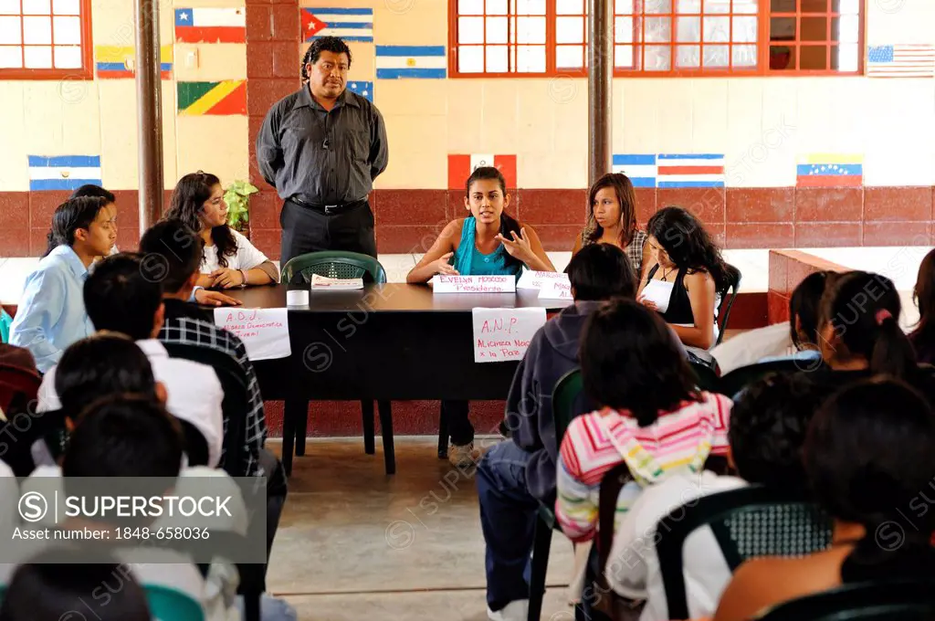 Students of the Escuela Ceiba school staging an election campaign, panel discussion, as part of their social studies class prior to the upcoming parli...