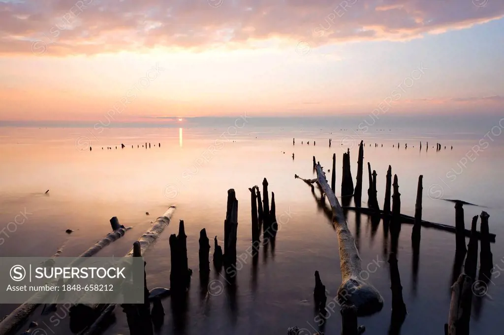 Evening mood at a wharf with ice on Lake Constance near Allensbach, Baden-Wuerttemberg, Germany, Europe
