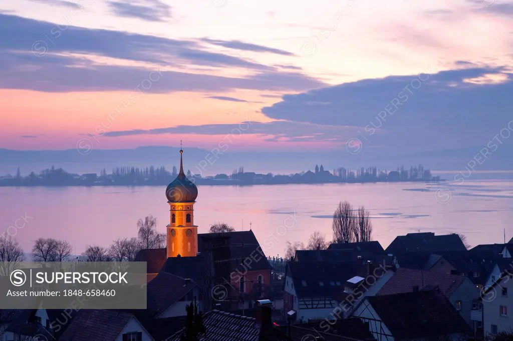 View of Allensbach and Reichenau island in the evening light with a frozen Lake Constance, Baden-Wuerttemberg, Germany, Europe