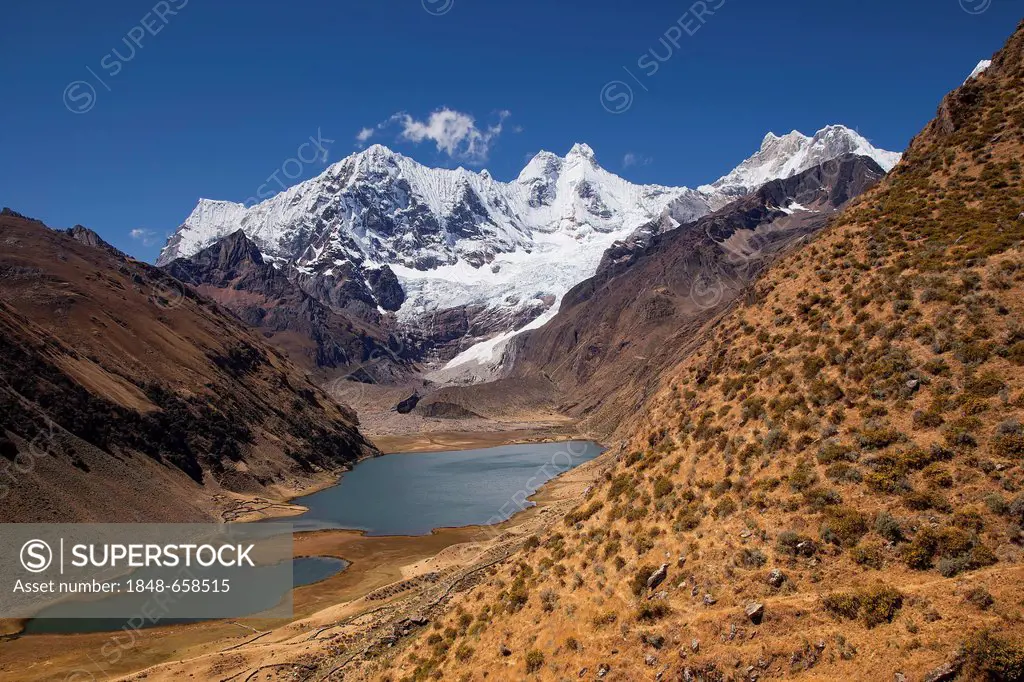 The lakes Laguna Jahuacocha and Laguna Solteracocha with the mountains Nevado Rondoy, Jirishanca, Nevado Yerupaja, Cordillera Huayhuash mountain range...