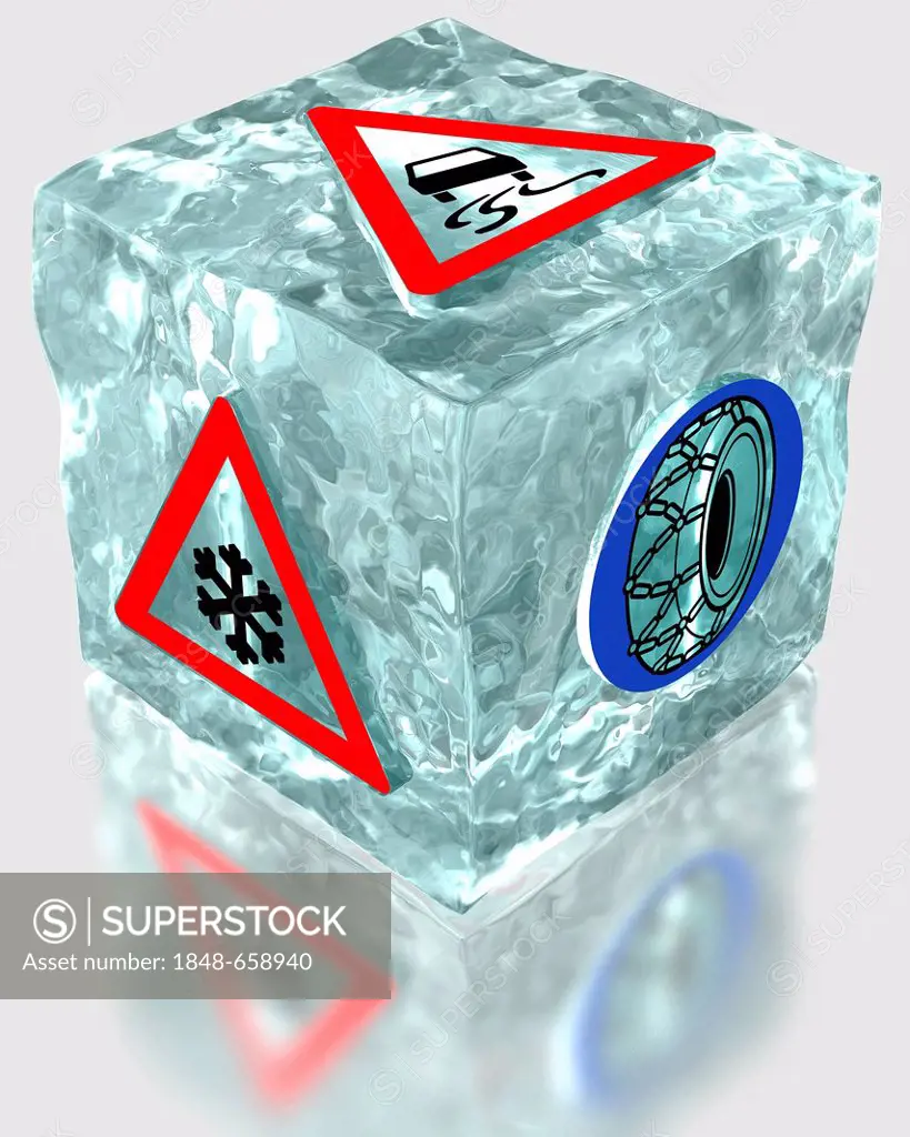 Block of ice with traffic warning signs for snow and icy roads, slippery roads and the need to use snow-chains, symbolic image for the mandatory use o...