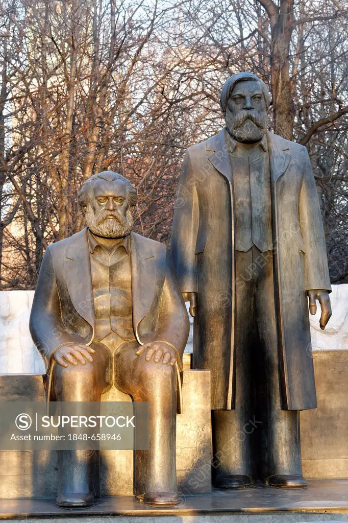 Karl Marx sitting and Friedrich Engels standing, statue from the GDR, Mitte district, Berlin, Germany, Europe