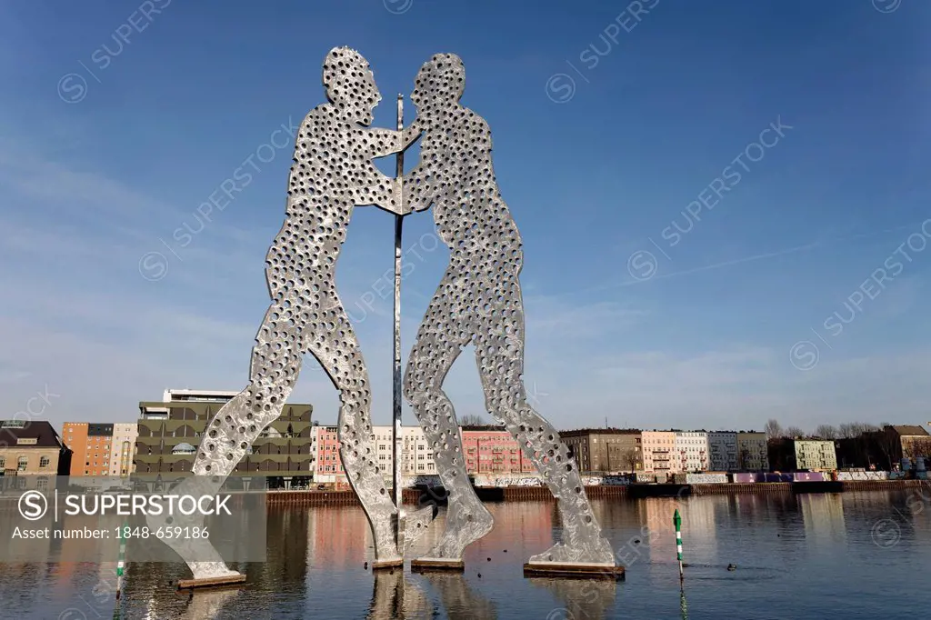 Molecule Man, monumental metal sculpture in the Spree river, human figures with holes, Treptow district, Berlin, Germany, Europe