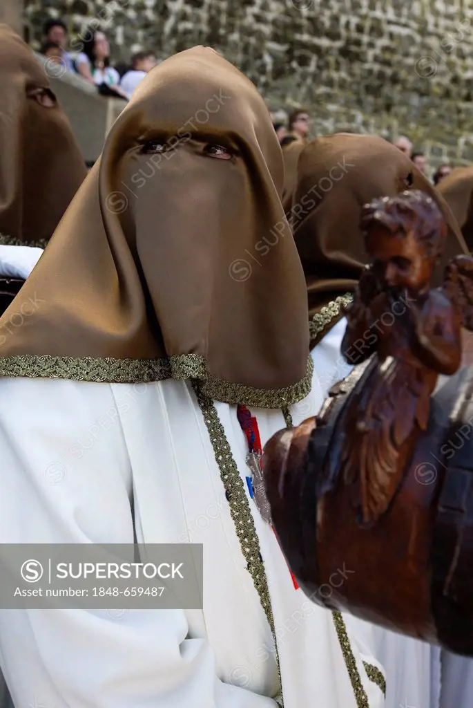 Penitents in a holy week procession in Ubeda, Jaén, Spain, Europe