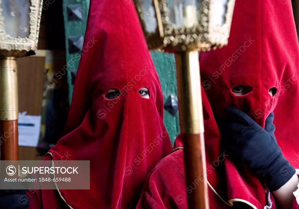 Two penitents in a holy week procession in Baeza, Jaén, Spain, Europe