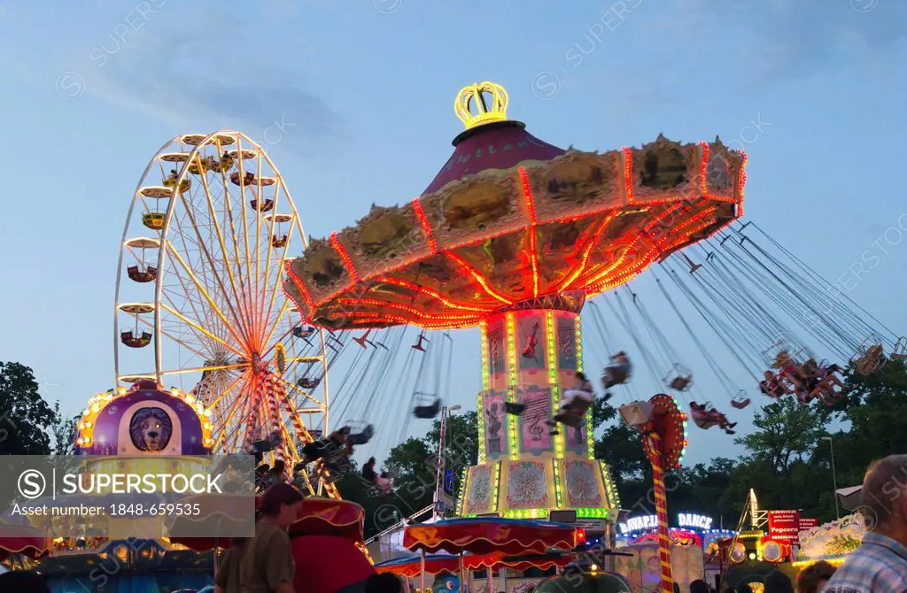 Swing caroussel and Ferris wheel at the Dult fun fair, Landshut, Bavaria, Germany, Europe