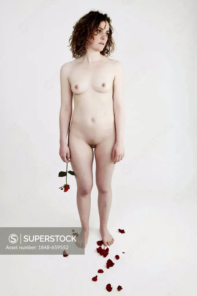 Woman, naked, holding rose, losing petals