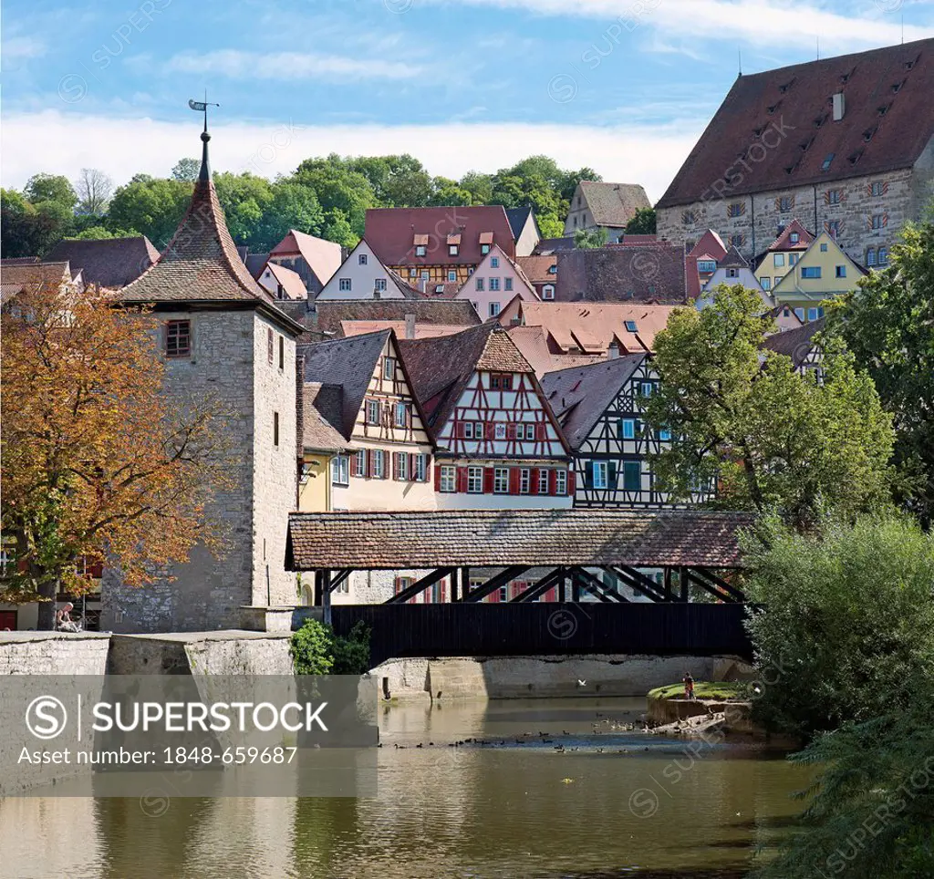 View of the historic district of Schwaebisch Hall with the Sulfer Steg footbridge across the Kocher river, the Sulfer Turm tower and the Kocherfront, ...