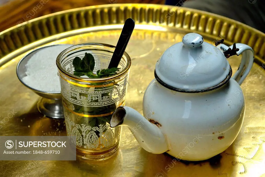 Teapot and a cup of tea in a cafe in Cairo, Egypt, Africa