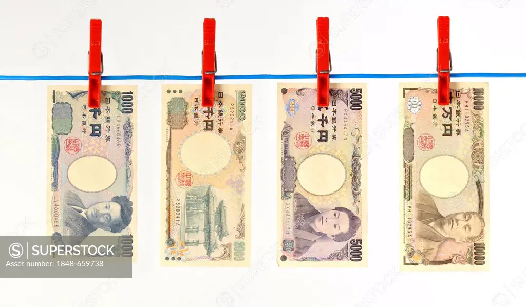 Japanese yen bank notes, bills on a clothesline, symbolic image for money laundering, dirty money