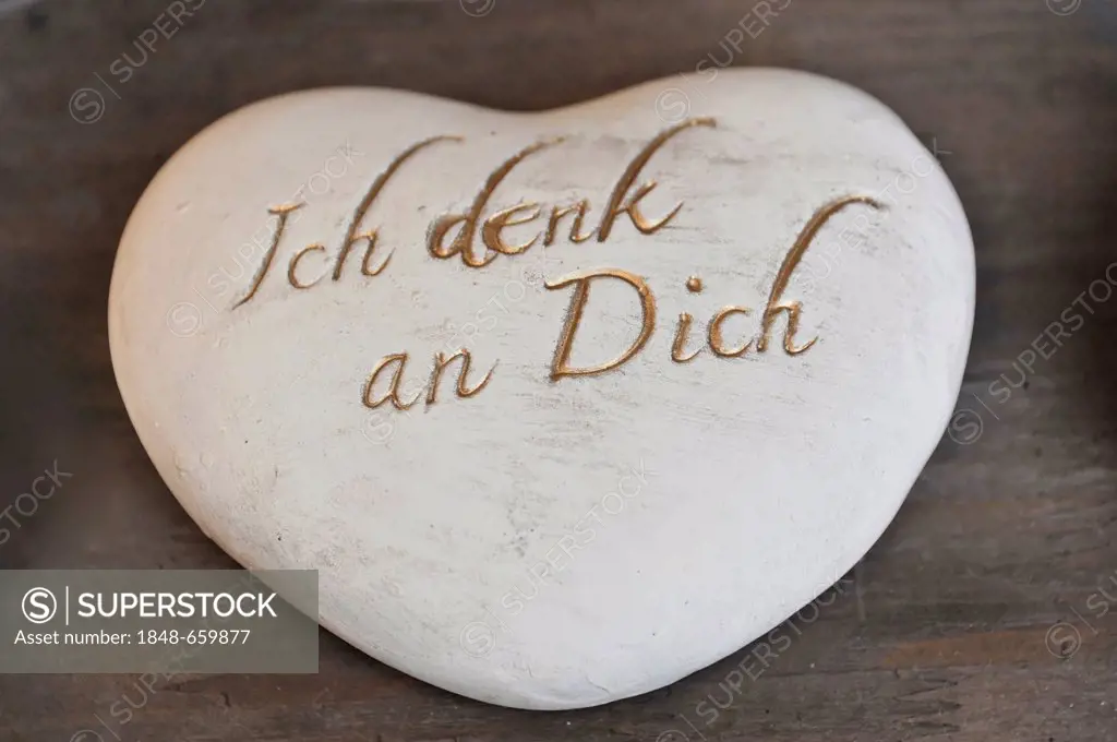 Stone with the engraving Ich denk an Dich, German for I think of you, souvenir