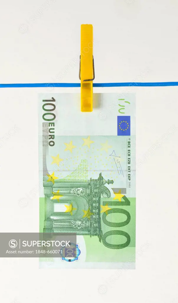 Euro note, bill on a clothesline, symbolic image for money laundering, dirty money