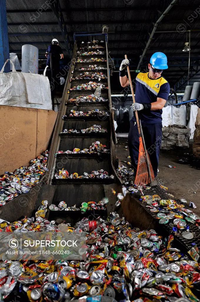Sorting machine for cans made of tinplate, aluminium, on a conveyor belt at a recycling plant, San José, Costa Rica, Latin America, Central America